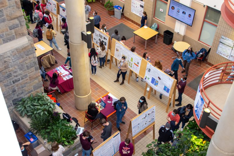 bird's eye view of undergraduate research mixer with faculty, students, and poster presentations