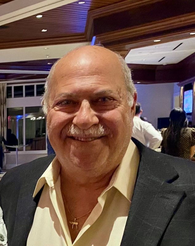 Mitch Koppelman picture of man inside with business jacket